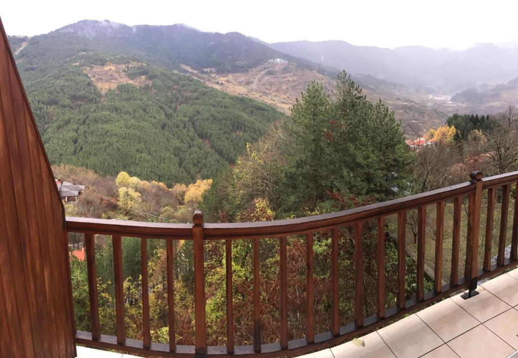 a balcony with a view of a mountain at Hotel Anax in Metsovo