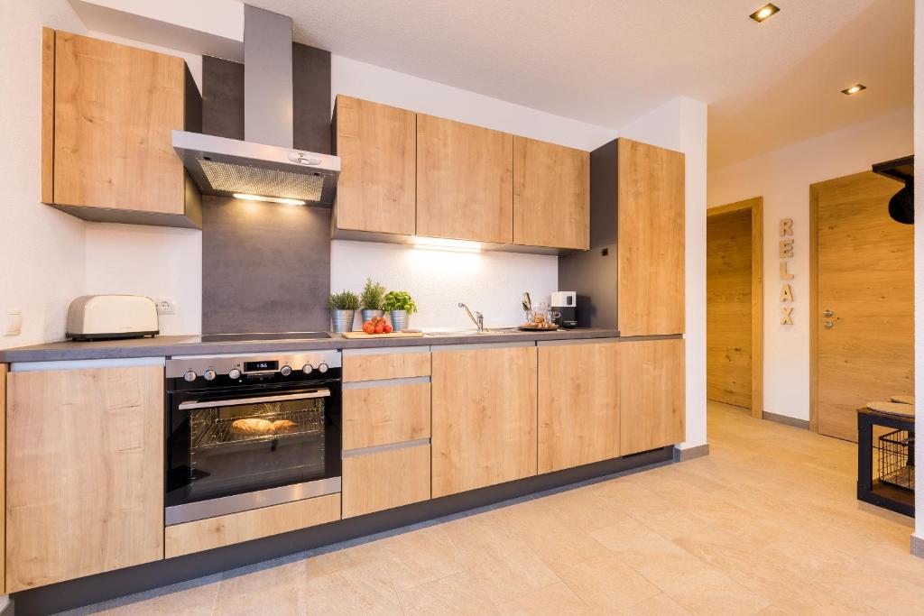 Kuchyň nebo kuchyňský kout v ubytování Easy Living Apartment Ötztal
