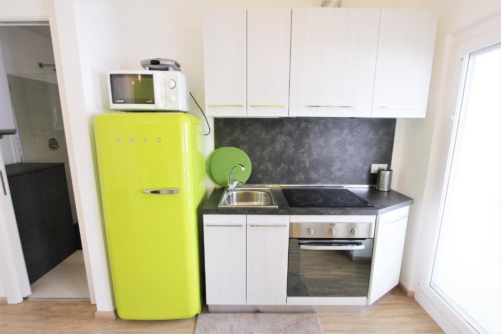 Kuchyňa alebo kuchynka v ubytovaní Hostdomus - Green Tech Apartment