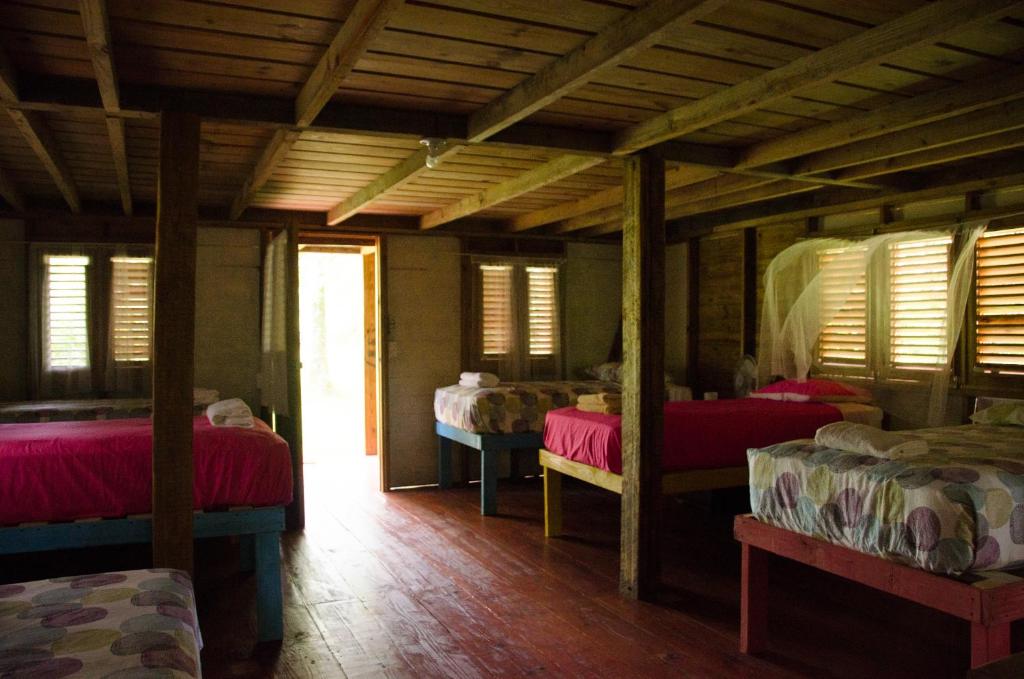 Postel nebo postele na pokoji v ubytování Aventura Rincon Ecolodge