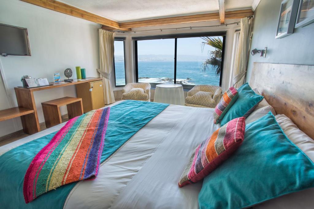 Uma cama ou camas num quarto em Hotel Oceanic