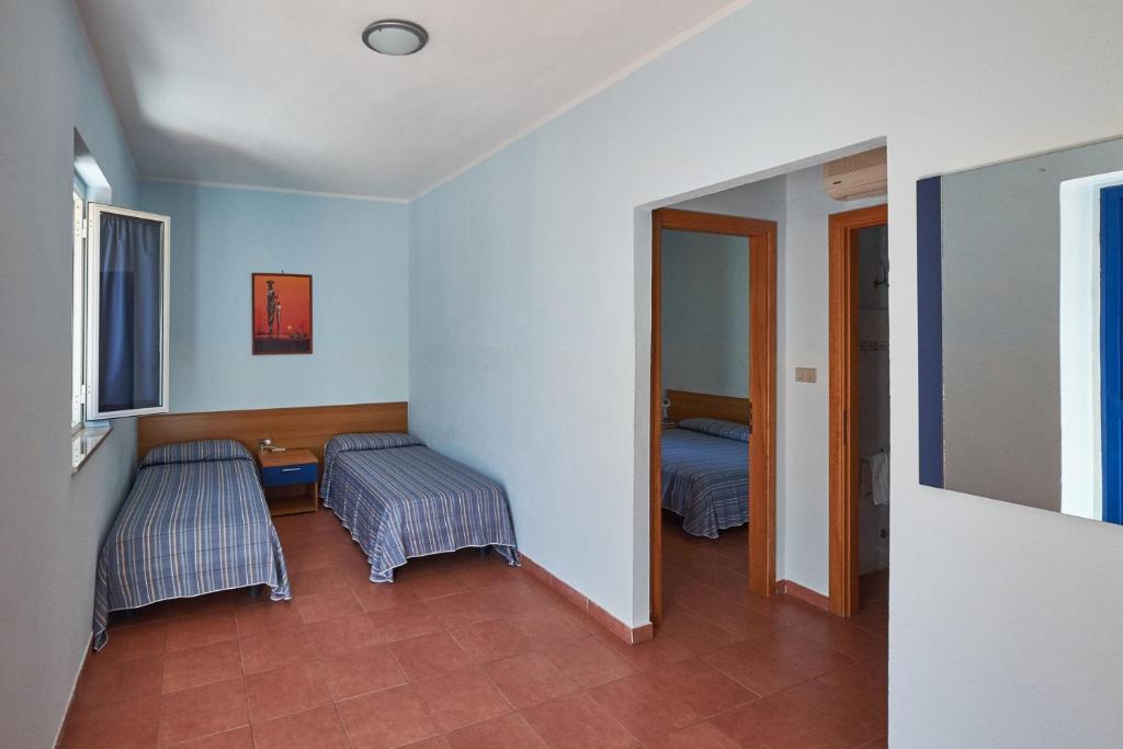 Villaggio L'Oasi - Sala Familiar (2 Adultos + 2 Niños)