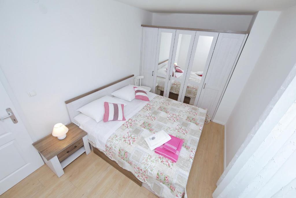 Postel nebo postele na pokoji v ubytování holiday home on DUGI OTOK - OTOK