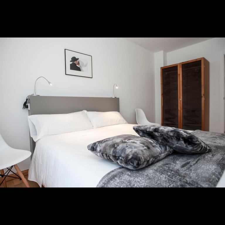 Postel nebo postele na pokoji v ubytování Pis del Mercat -aire acondicionado en todas las habitaciones y salón-