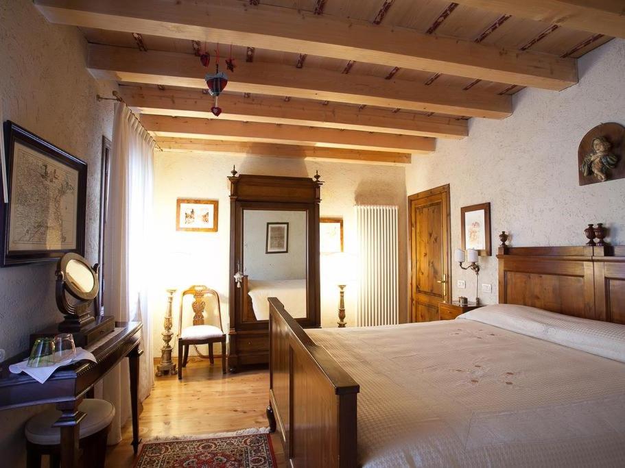 Postel nebo postele na pokoji v ubytování B&B Asolo Casapagnano