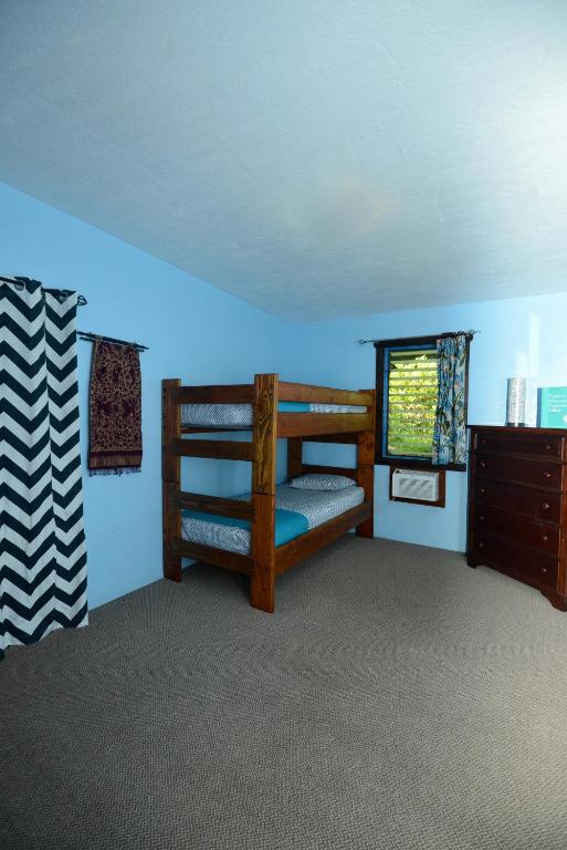 Postel nebo postele na pokoji v ubytování Kalani Hawaii Private Lodging
