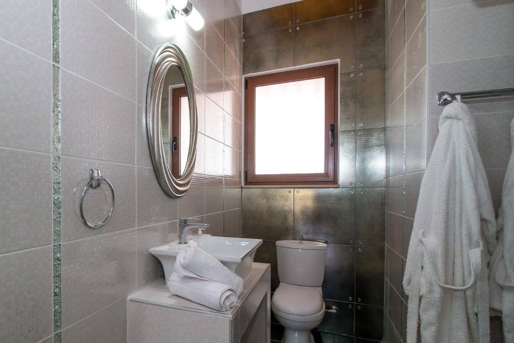 Koupelna v ubytování Emerald Dream Apartment
