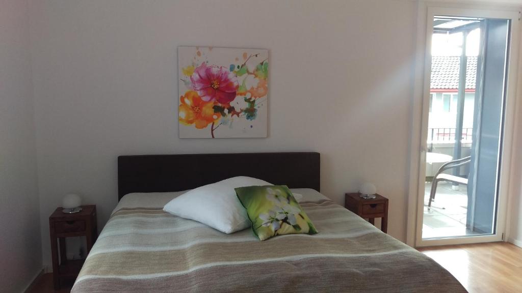 Postel nebo postele na pokoji v ubytování Hotel Enjoy