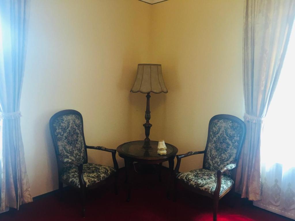 Ein Sitzbereich in der Unterkunft Lambach Villa