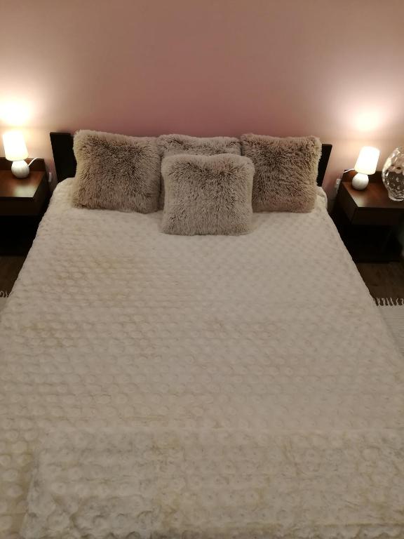 Posteľ alebo postele v izbe v ubytovaní Apartament wSPAniały.