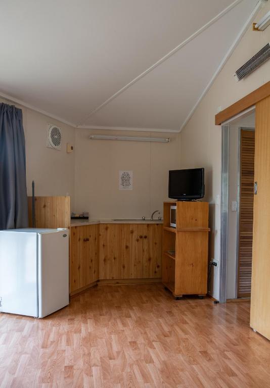 Kuchyň nebo kuchyňský kout v ubytování Pine Country Caravan Park
