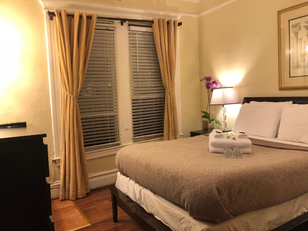 Postel nebo postele na pokoji v ubytování Luz Hotel