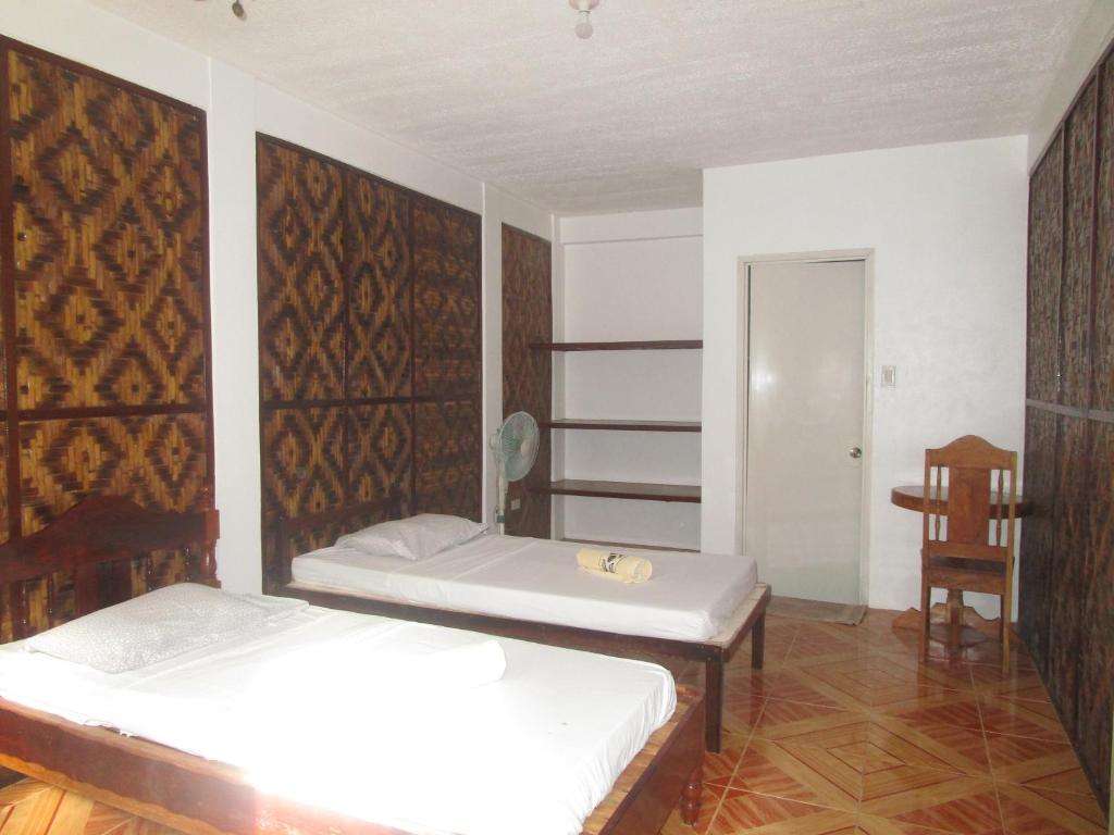 Postel nebo postele na pokoji v ubytování Point 303 Resort
