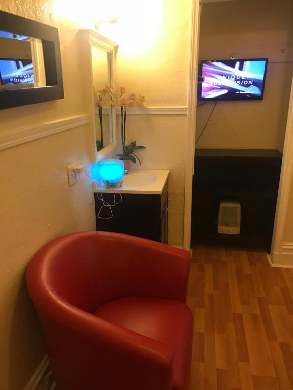 TV a/nebo společenská místnost v ubytování Luz Hotel