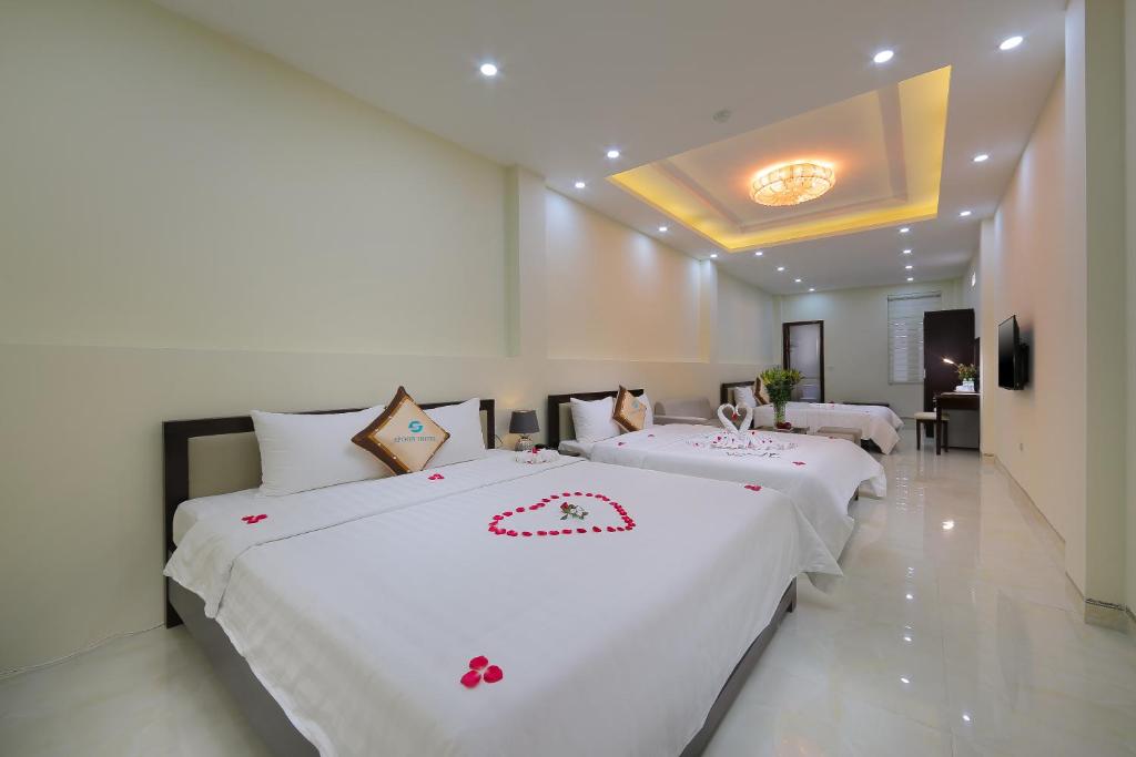 Postel nebo postele na pokoji v ubytování Spoon Hotel