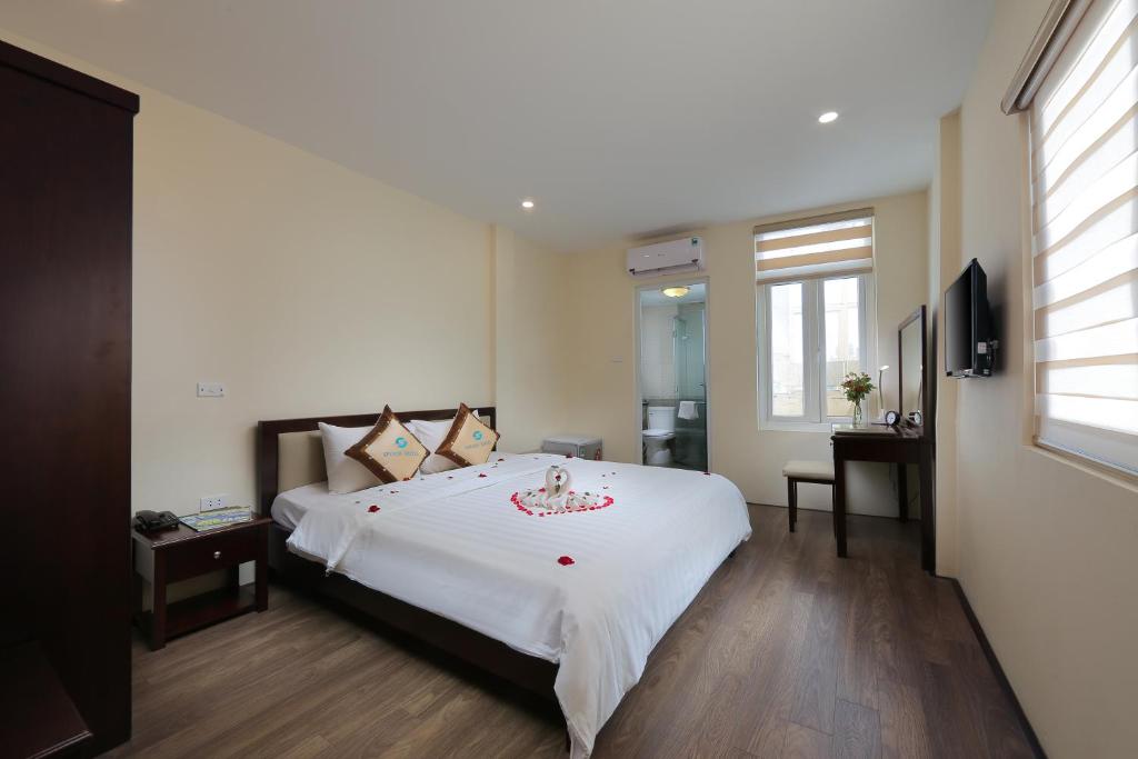 Postel nebo postele na pokoji v ubytování Spoon Hotel