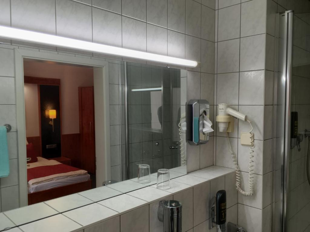 Koupelna v ubytování Hotel Hansa