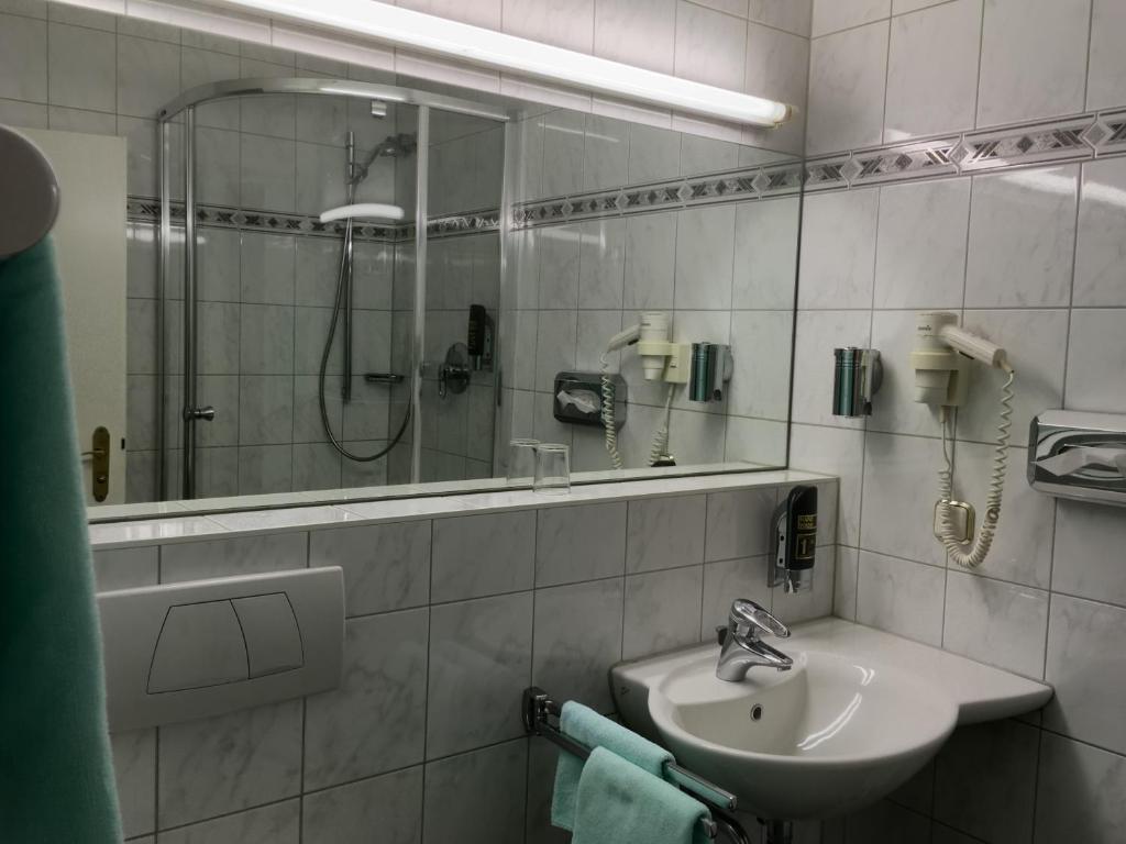 Koupelna v ubytování Hotel Hansa