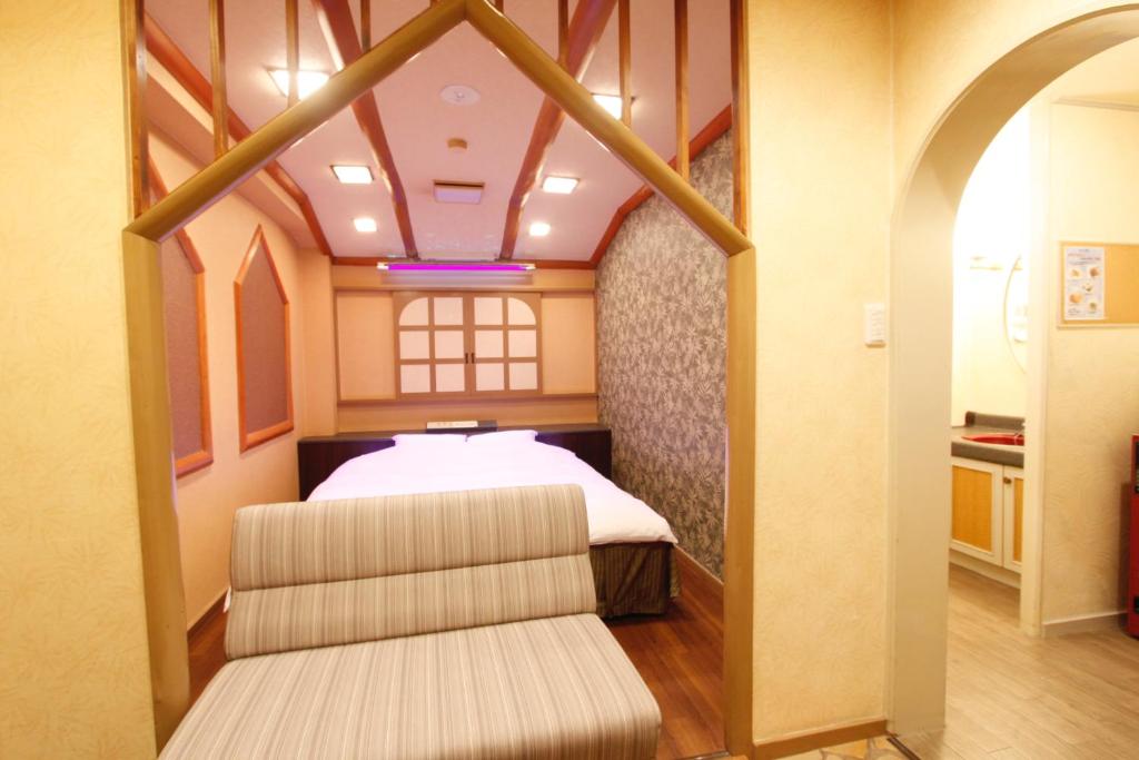 Postel nebo postele na pokoji v ubytování Hotel Mio (Adult Only)