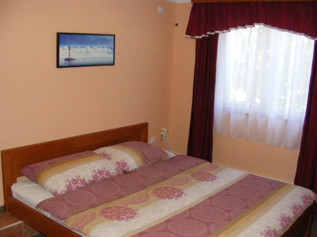 Postel nebo postele na pokoji v ubytování Hotel Drumski Raj