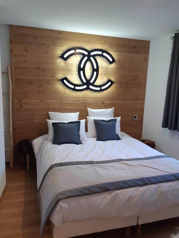 Postel nebo postele na pokoji v ubytování Le Grizzly Luxe Location