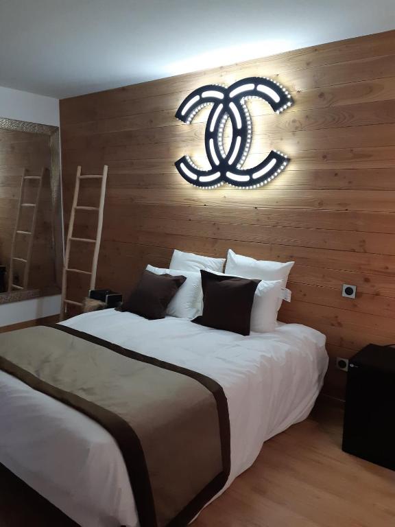 Postel nebo postele na pokoji v ubytování Le Grizzly Luxe Location