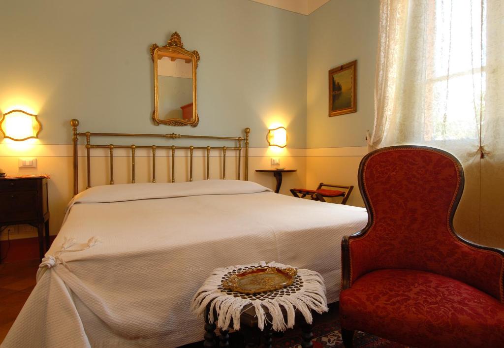 Postel nebo postele na pokoji v ubytování Il Rondò Boutique Hotel