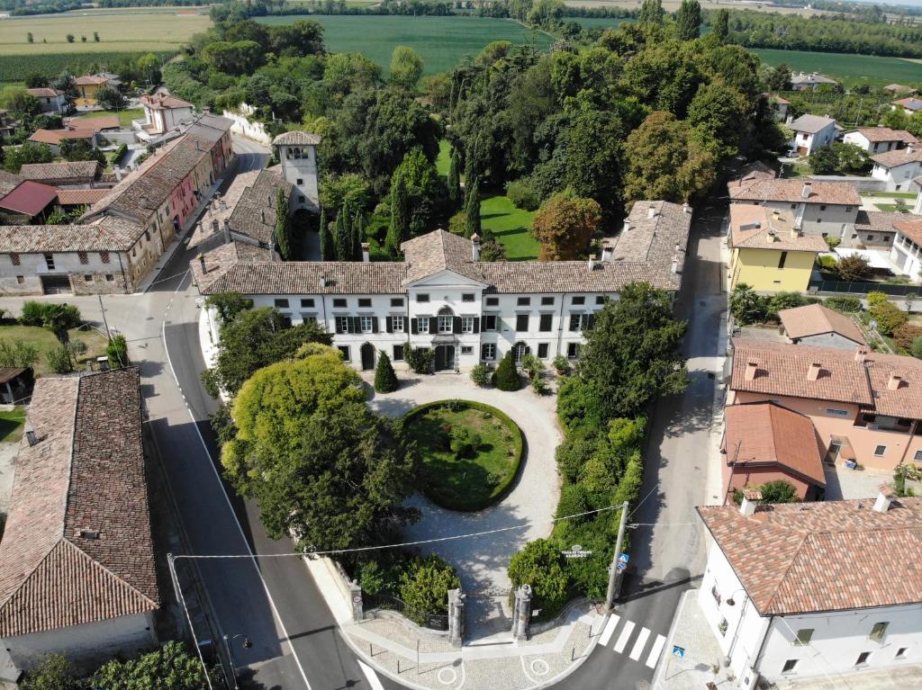 an aerial view of a house in a village at Villa Di Tissano in Tissano