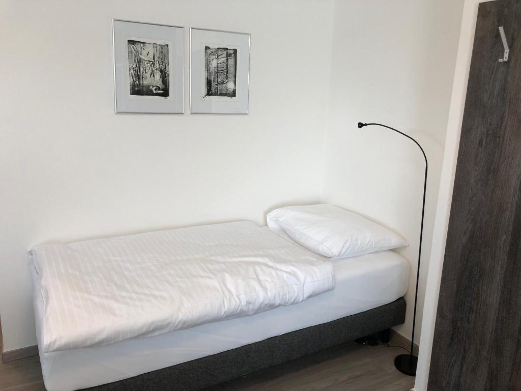 Postel nebo postele na pokoji v ubytování KM Hotel Murtal