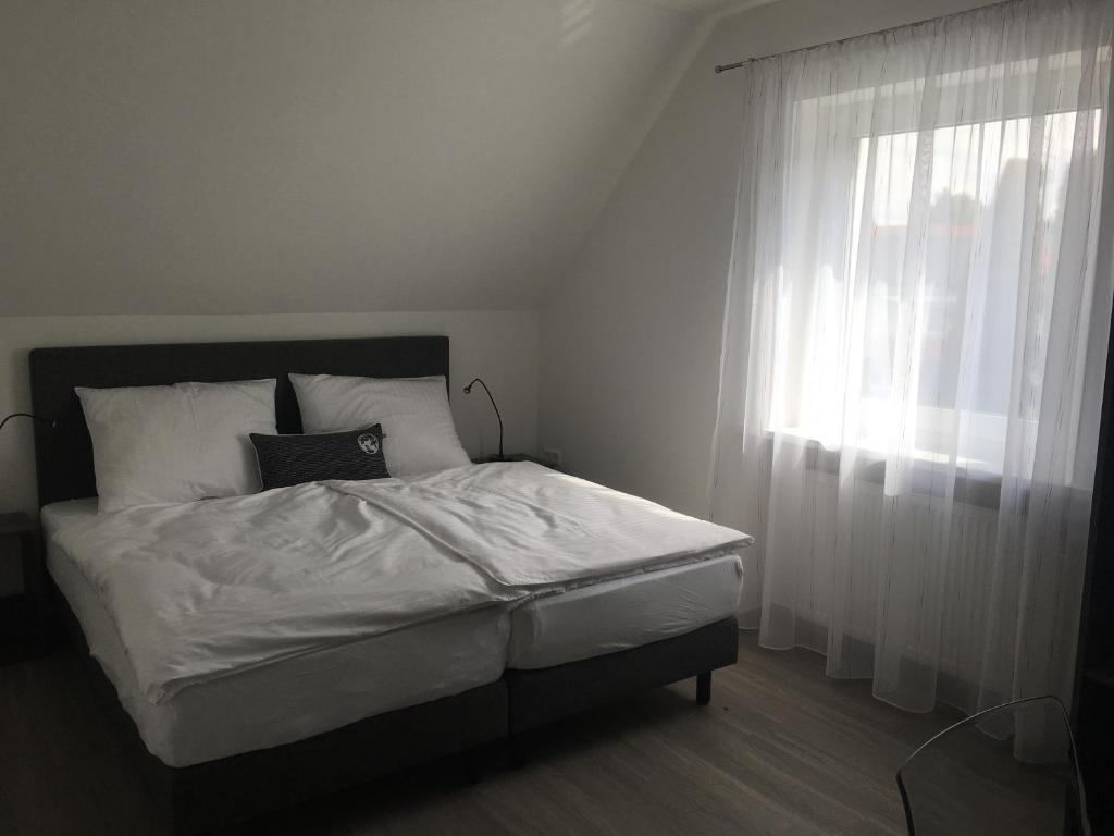Postel nebo postele na pokoji v ubytování KM Hotel Murtal