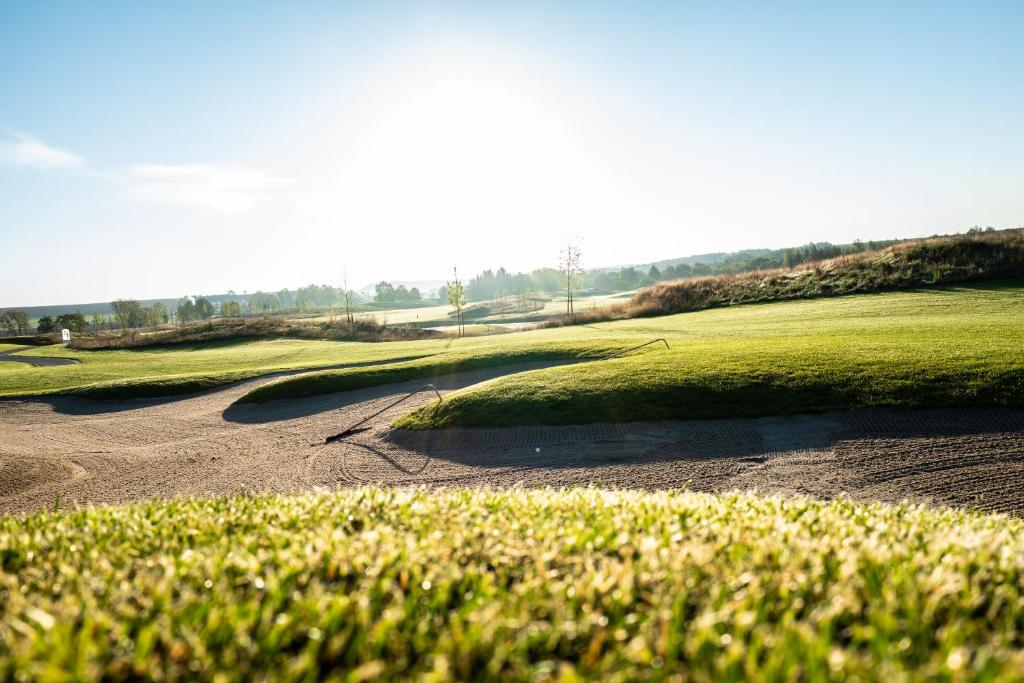 Kemudahan golf di hotel atau berdekatan