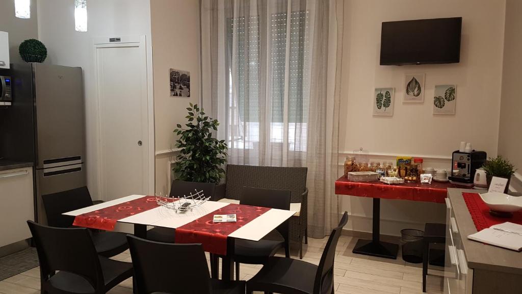 Televízia a/alebo spoločenská miestnosť v ubytovaní Casantò guest home