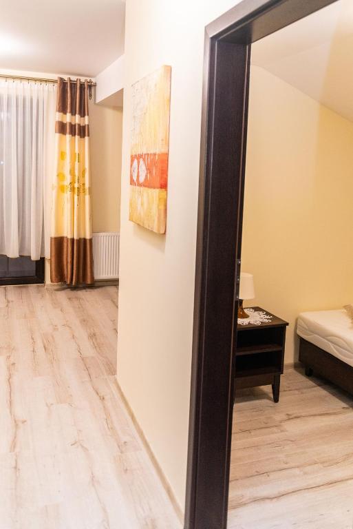 Postel nebo postele na pokoji v ubytování Hotel Artur
