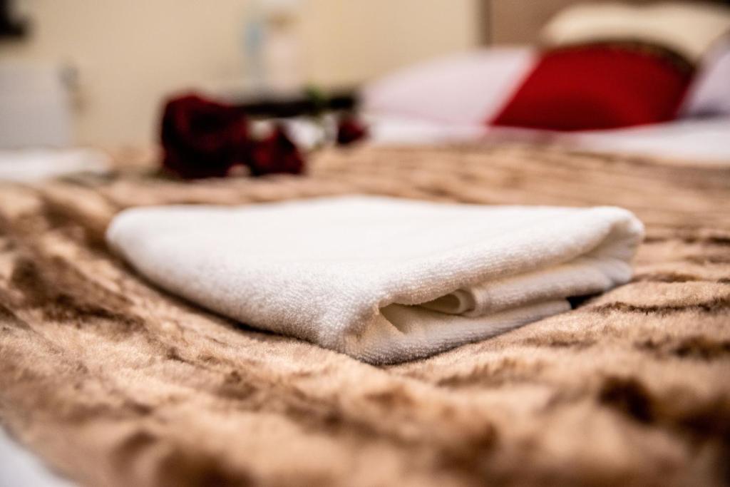 Postel nebo postele na pokoji v ubytování Hotel Artur
