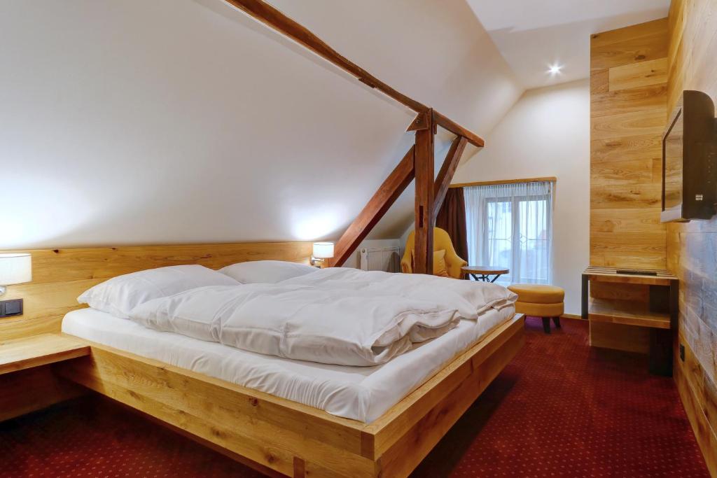 Letto o letti in una camera di Villa Conti