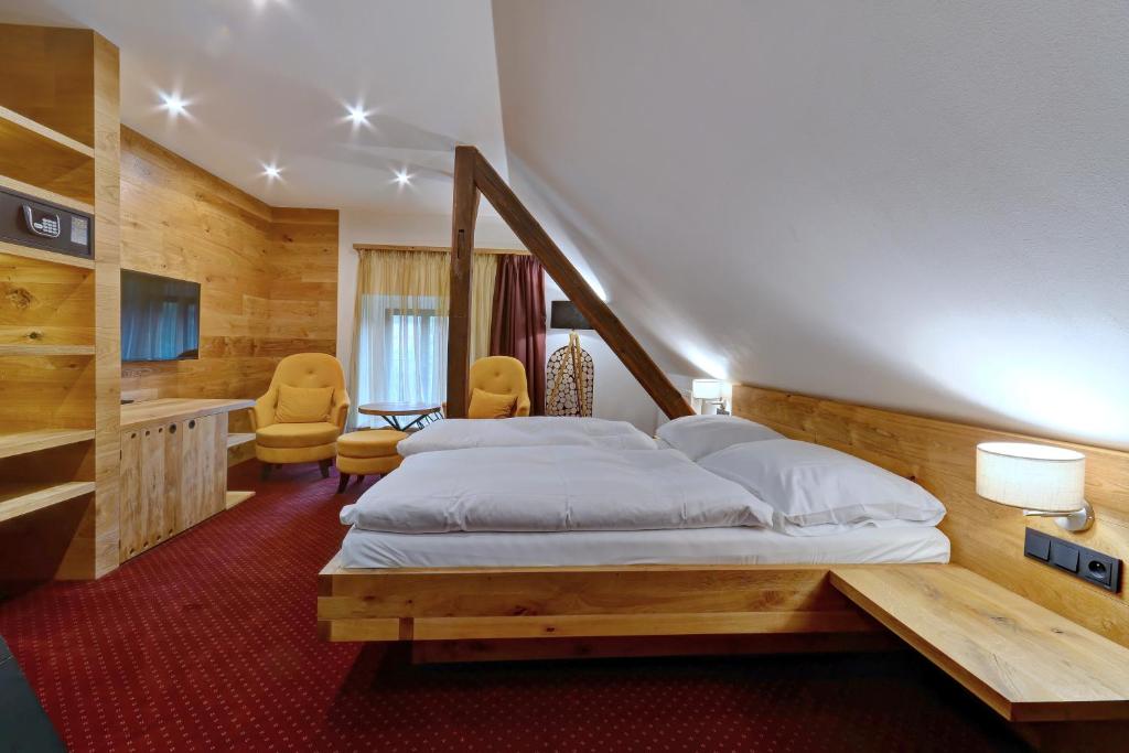 Letto o letti in una camera di Villa Conti