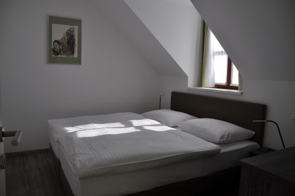 Postel nebo postele na pokoji v ubytování KM Hotel Murtal