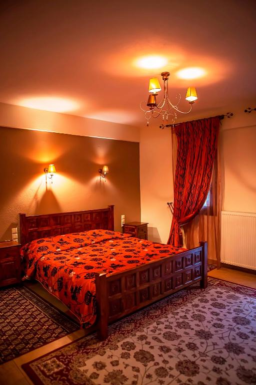 Posteľ alebo postele v izbe v ubytovaní Andromeda Hotel Limni Plastira