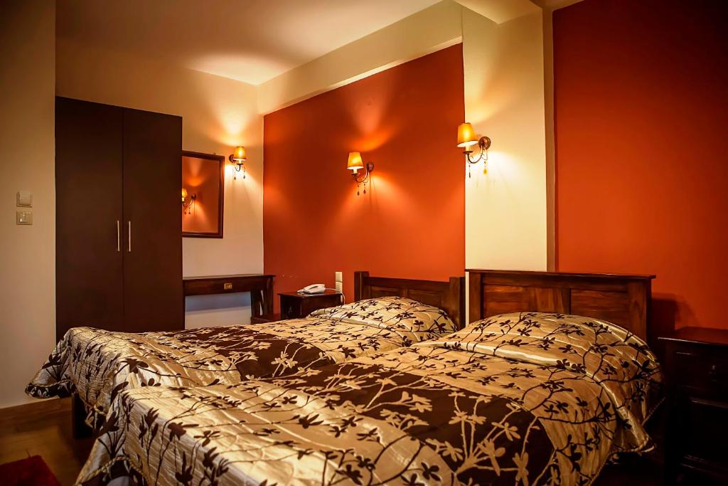 Posteľ alebo postele v izbe v ubytovaní Andromeda Hotel Limni Plastira