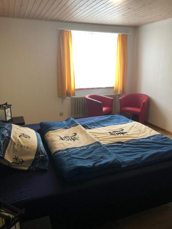 Postel nebo postele na pokoji v ubytování Casa Wellbella