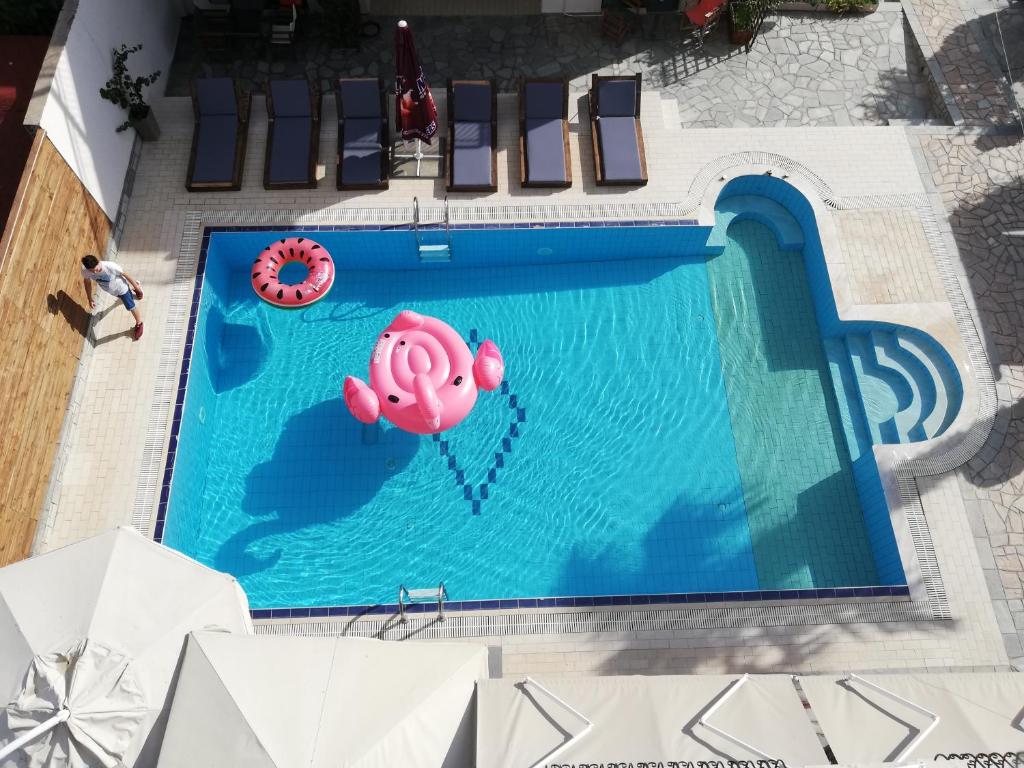 Bazén v ubytování Syrtaki Hotel nebo v jeho okolí