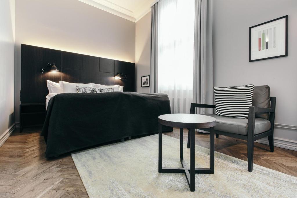 Postel nebo postele na pokoji v ubytování Apótek Hotel Reykjavík by Keahotels