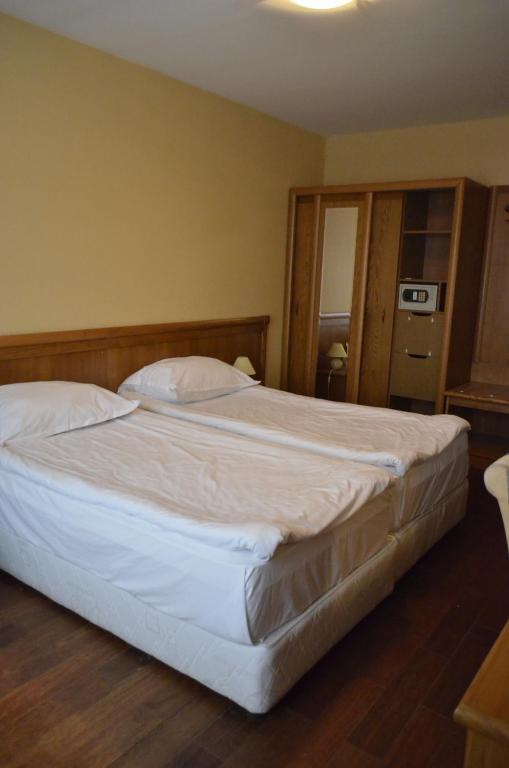 Postel nebo postele na pokoji v ubytování Bellevue Residence Apartments