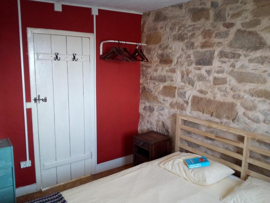 Postel nebo postele na pokoji v ubytování Quinta Laranja - Turismo Rural -