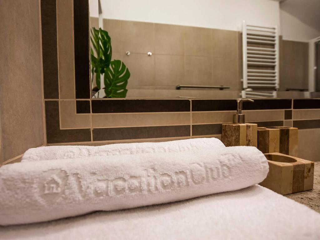 Postel nebo postele na pokoji v ubytování VacationClub - Rezydencja Bursztyn Apartament 36