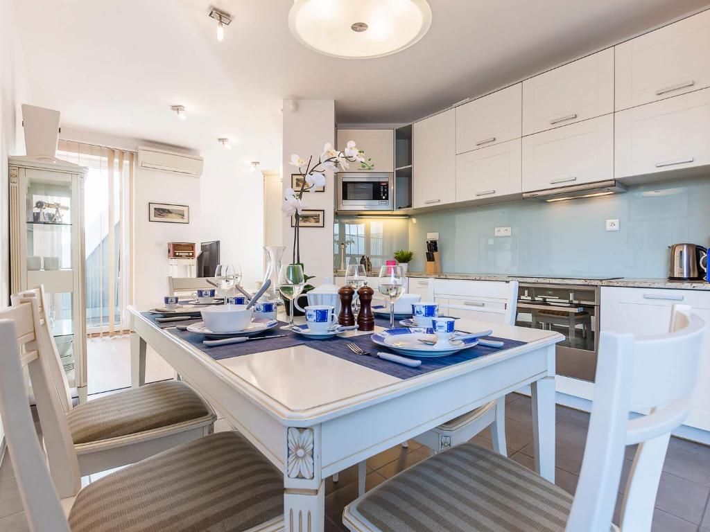 Kuchyň nebo kuchyňský kout v ubytování VacationClub - Rezydencja Bursztyn Apartament 36