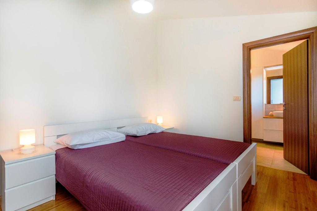 Postel nebo postele na pokoji v ubytování Villa Jadran