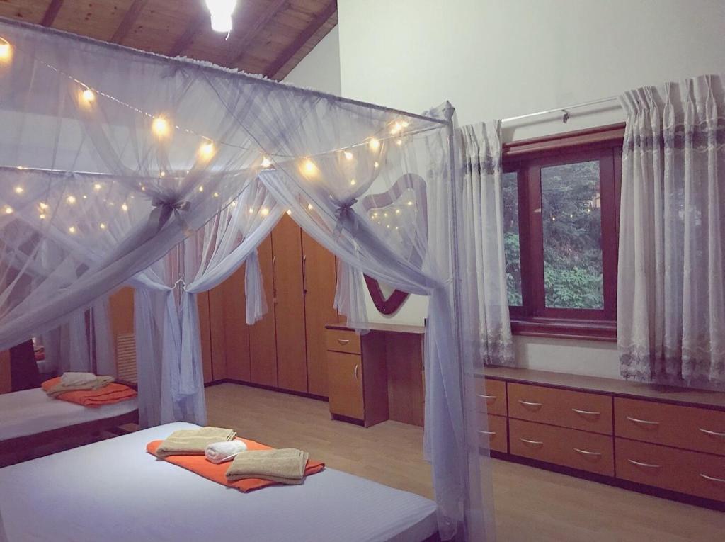 Postel nebo postele na pokoji v ubytování 中国蒲公英民宿山景别墅与中餐Dandelion Guest house Villa with Mount View