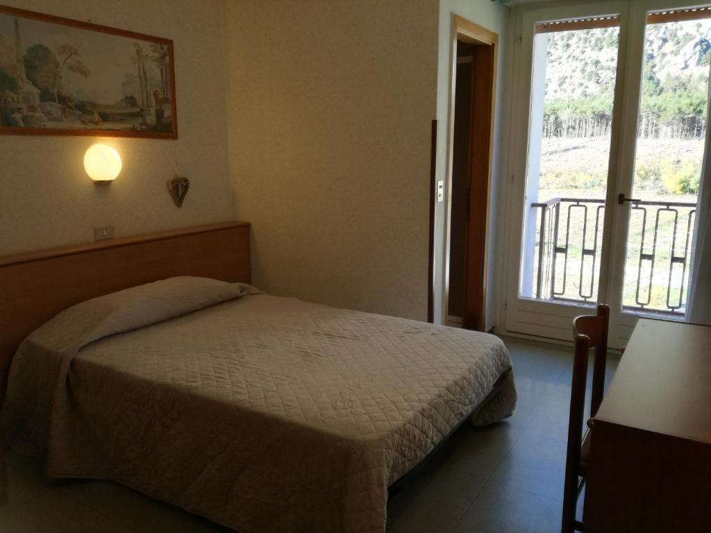 Posteľ alebo postele v izbe v ubytovaní Aktiv Hotel Eden