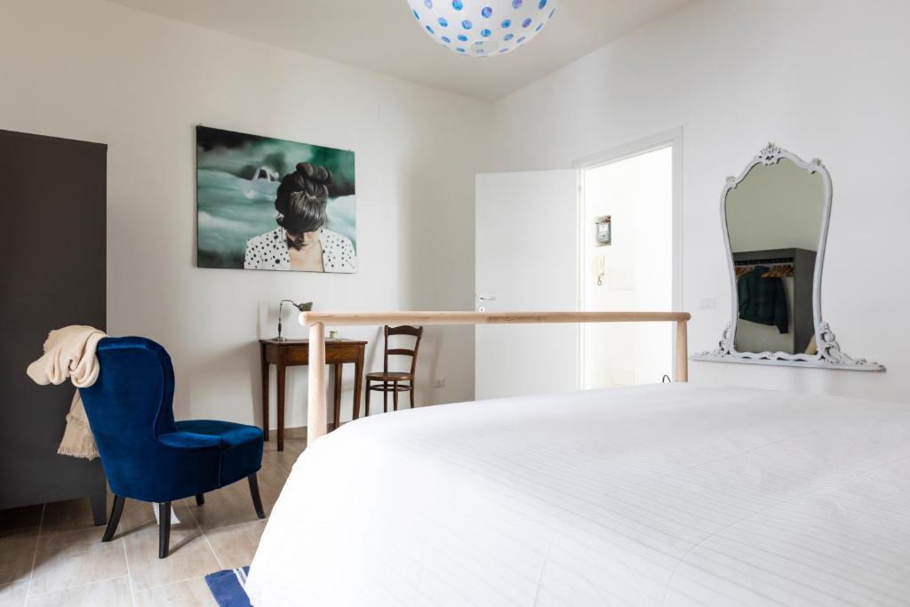 A bed or beds in a room at Casa Otto